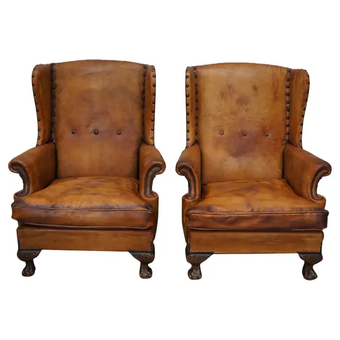 Pair of Patinated Dutch Wingback Cognac Colored Leather Club Chairs