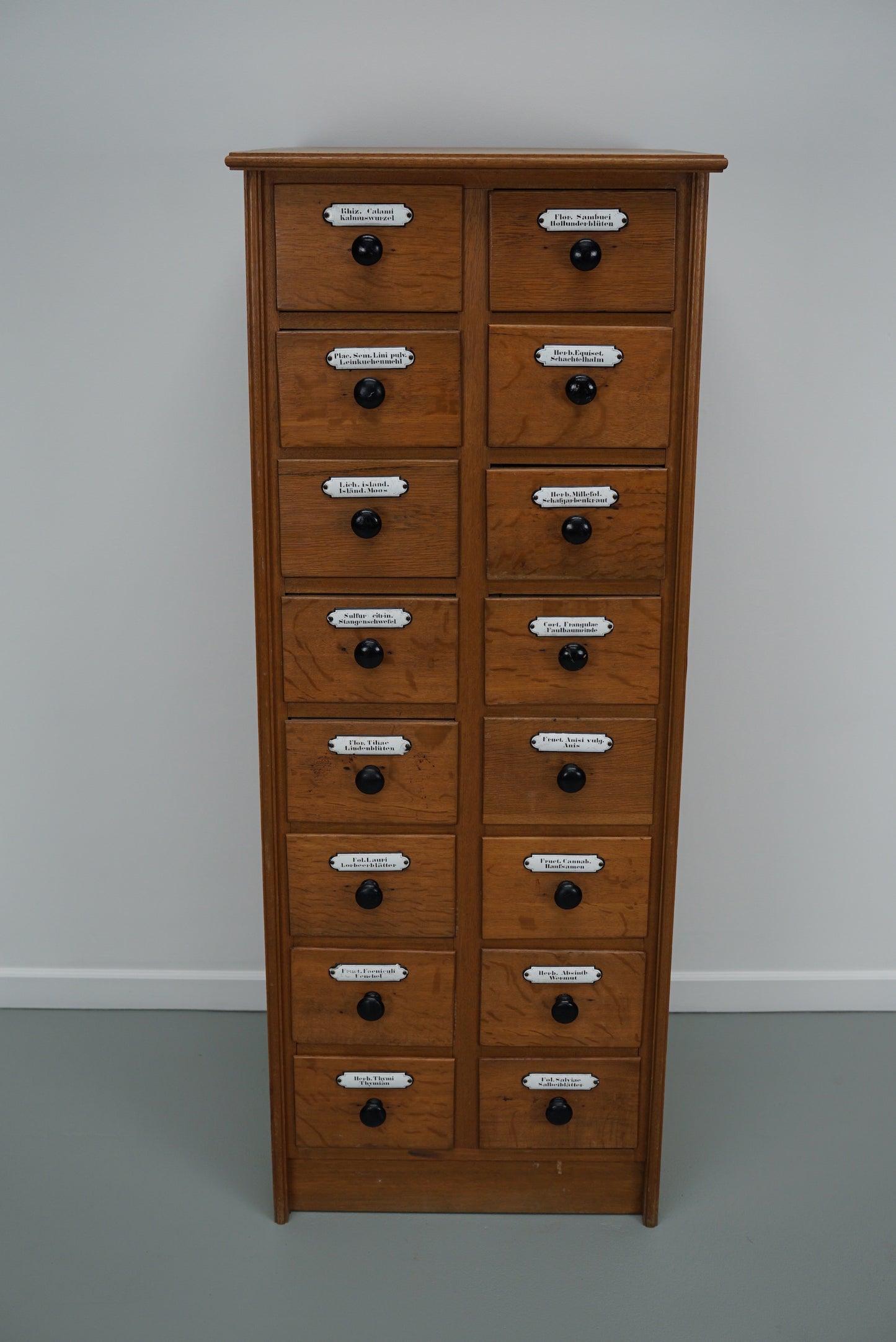 Vintage German Oak Apothecary Cabinet with Enamel Shields, 1940s