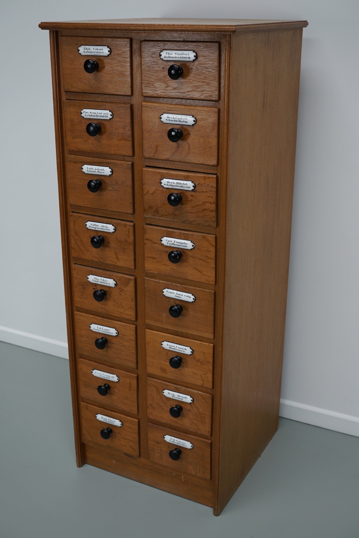 Vintage German Oak Apothecary Cabinet with Enamel Shields, 1940s