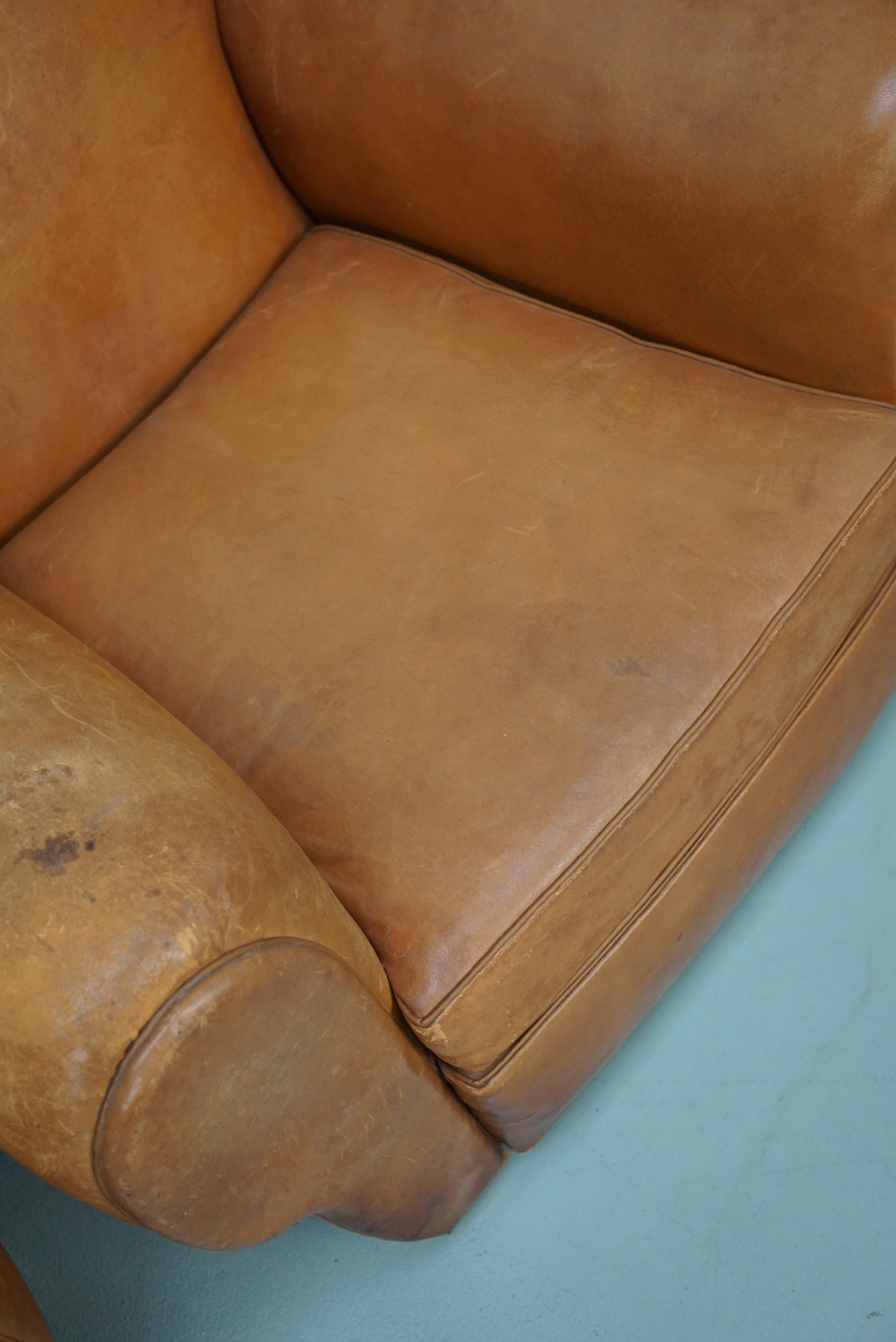 Pair of French Cognac Moustache Back Leather Club Chairs, 1950s