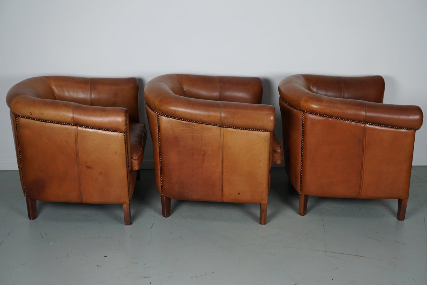 Vintage Dutch Cognac Leather Club Chairs, Set of Three with Two Footstools
