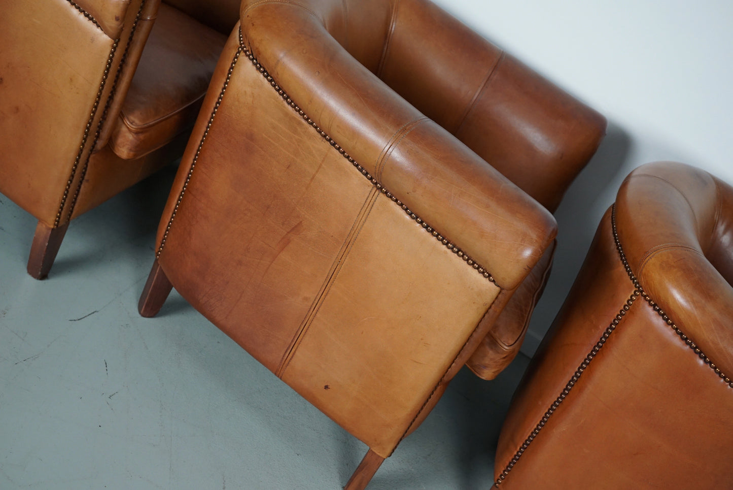 Vintage Dutch Cognac Leather Club Chairs, Set of Three with Two Footstools