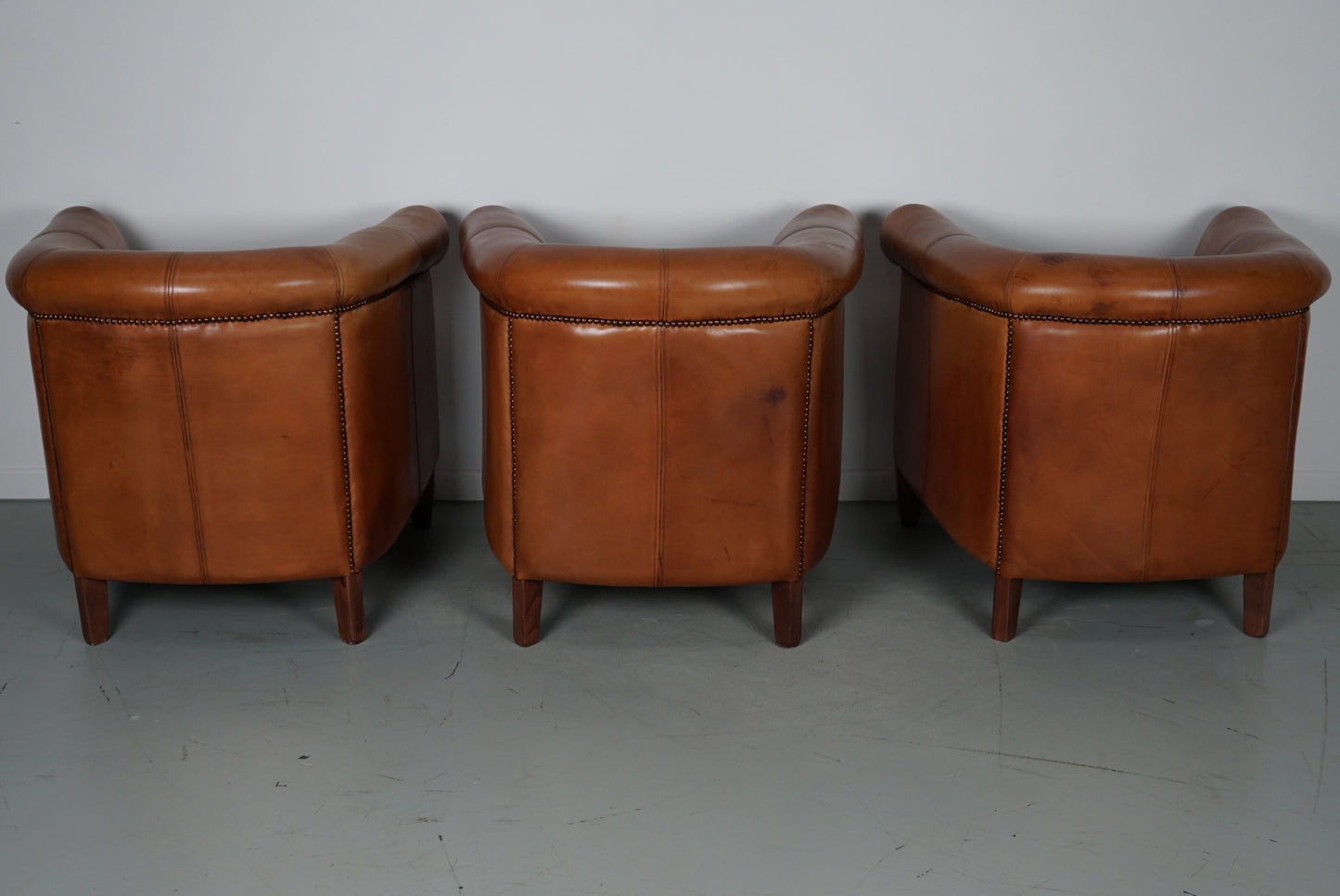 Vintage Dutch Cognac Leather Club Chairs, Set of Three with Two Footstools