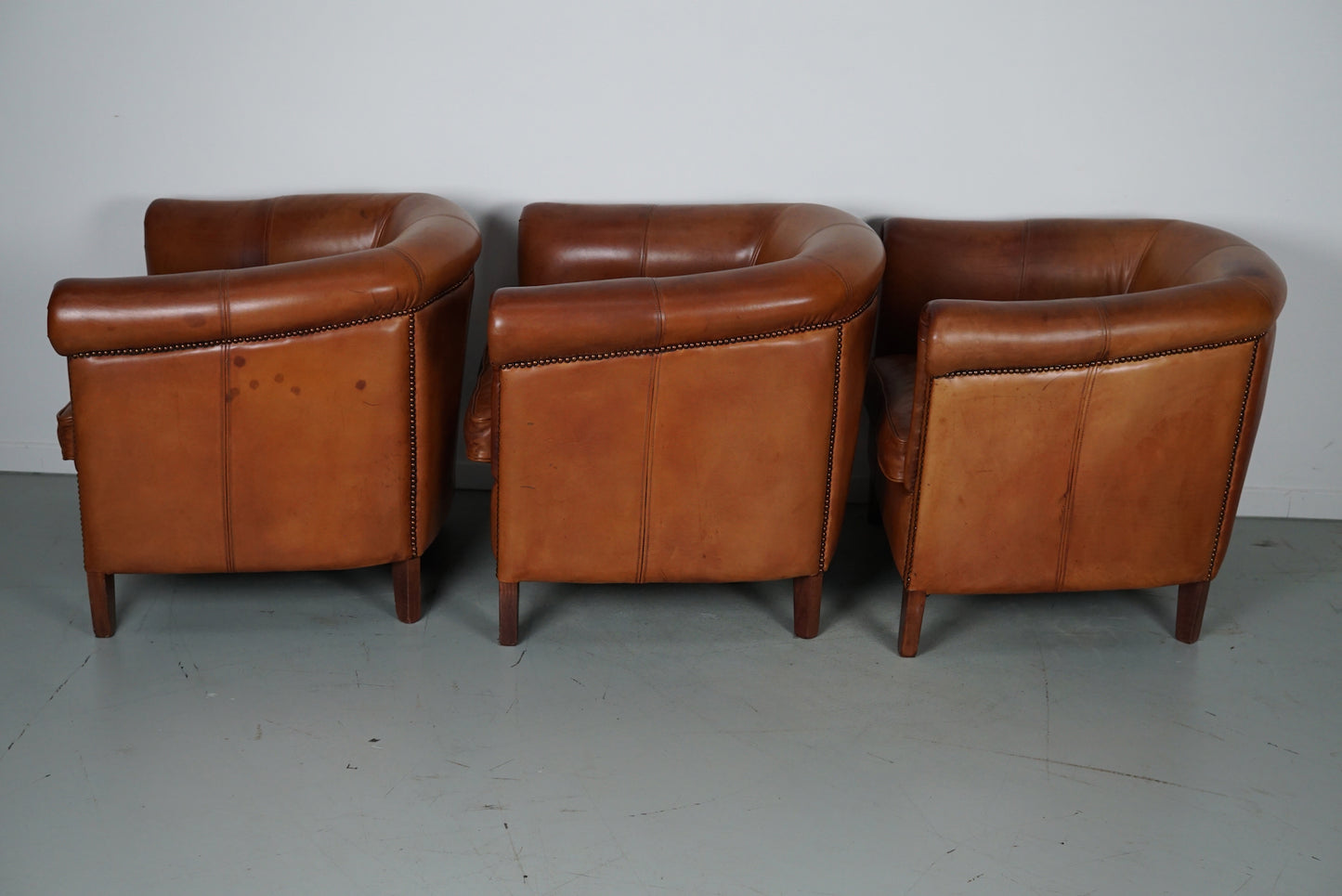 Vintage Dutch Cognac Leather Club Chairs, Set of Three with Two Footstools