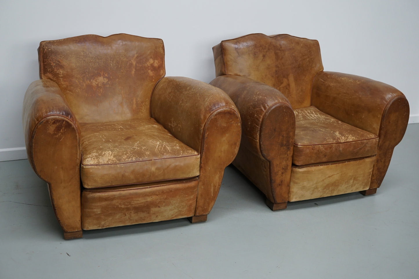 Pair of French Cognac Moustache Back Leather Club Chairs, 1940s
