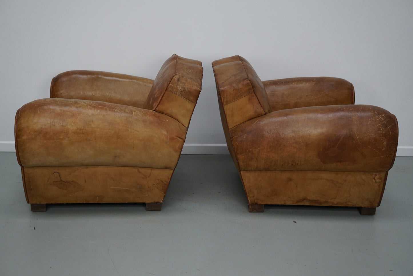 Pair of French Cognac Moustache Back Leather Club Chairs, 1940s