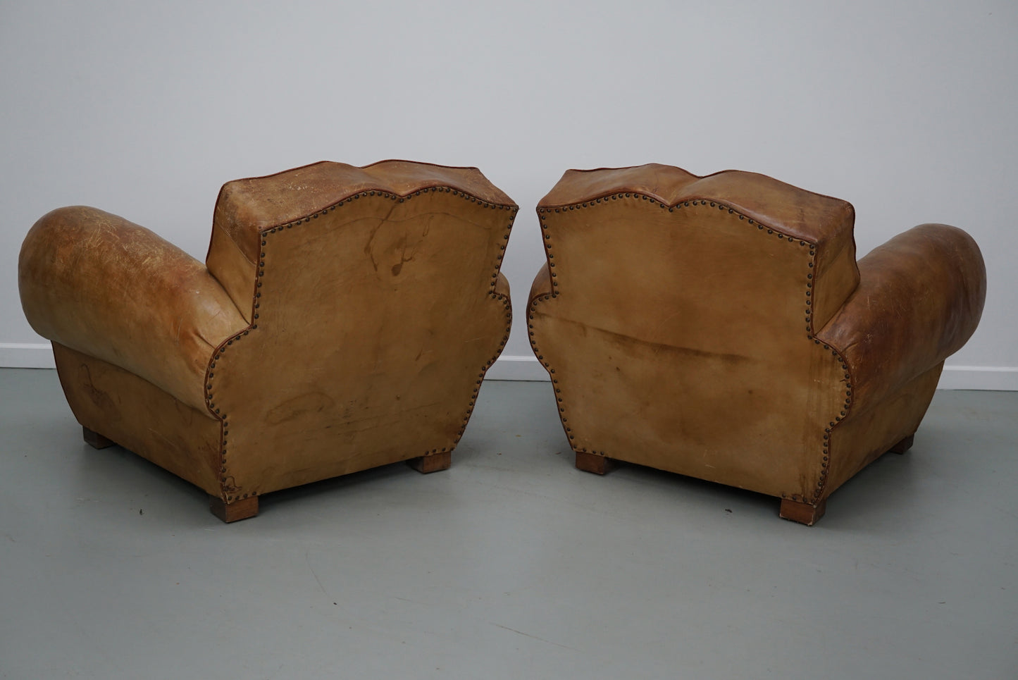 Pair of French Cognac Moustache Back Leather Club Chairs, 1940s