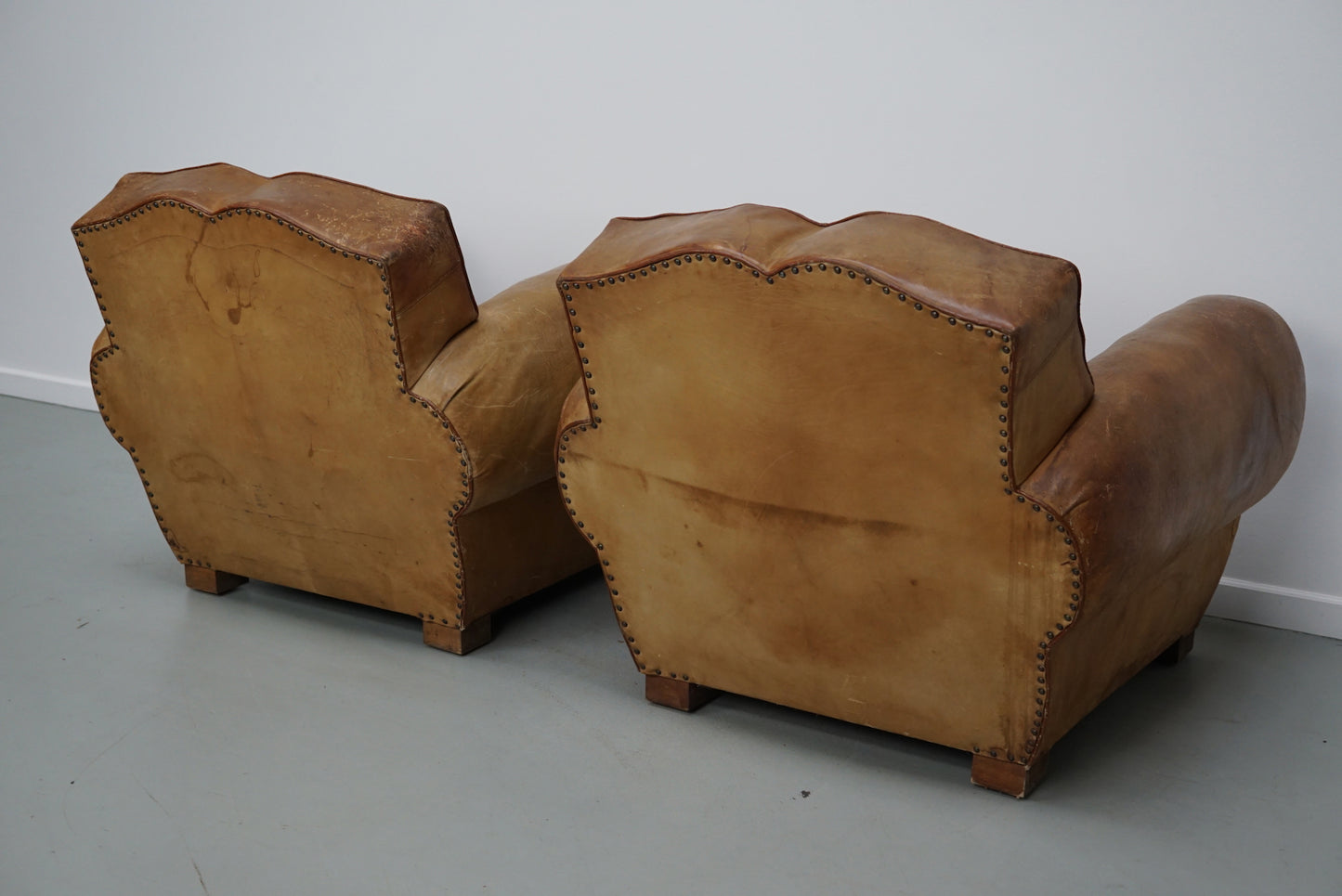 Pair of French Cognac Moustache Back Leather Club Chairs, 1940s