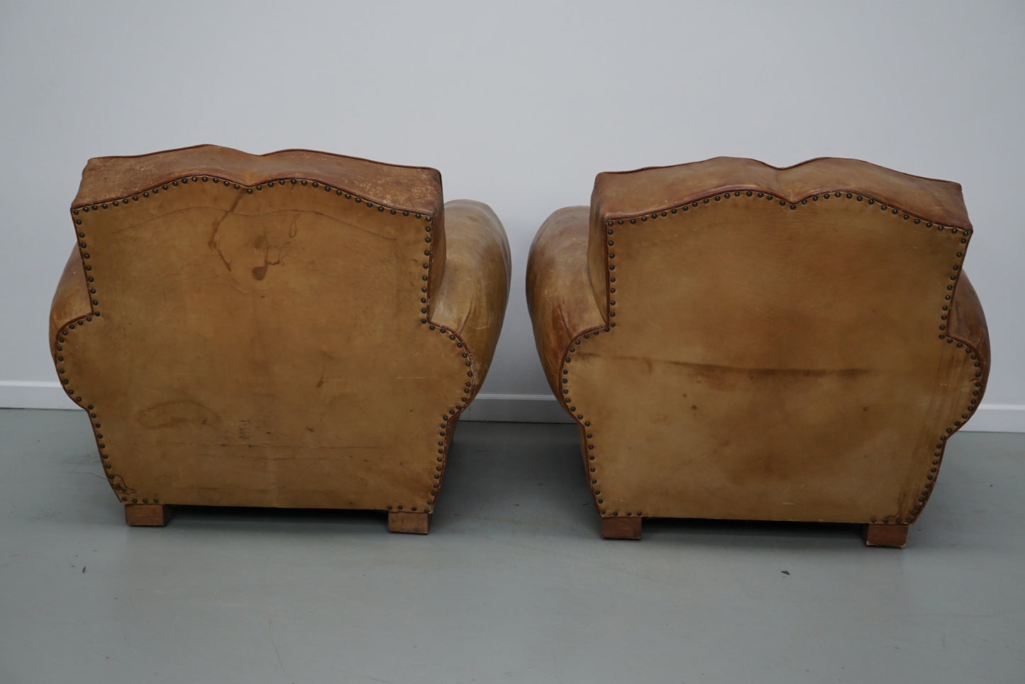Pair of French Cognac Moustache Back Leather Club Chairs, 1940s