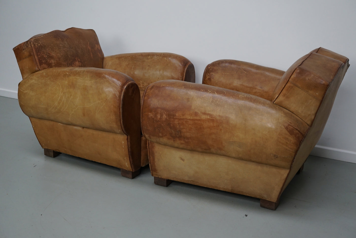 Pair of French Cognac Moustache Back Leather Club Chairs, 1940s