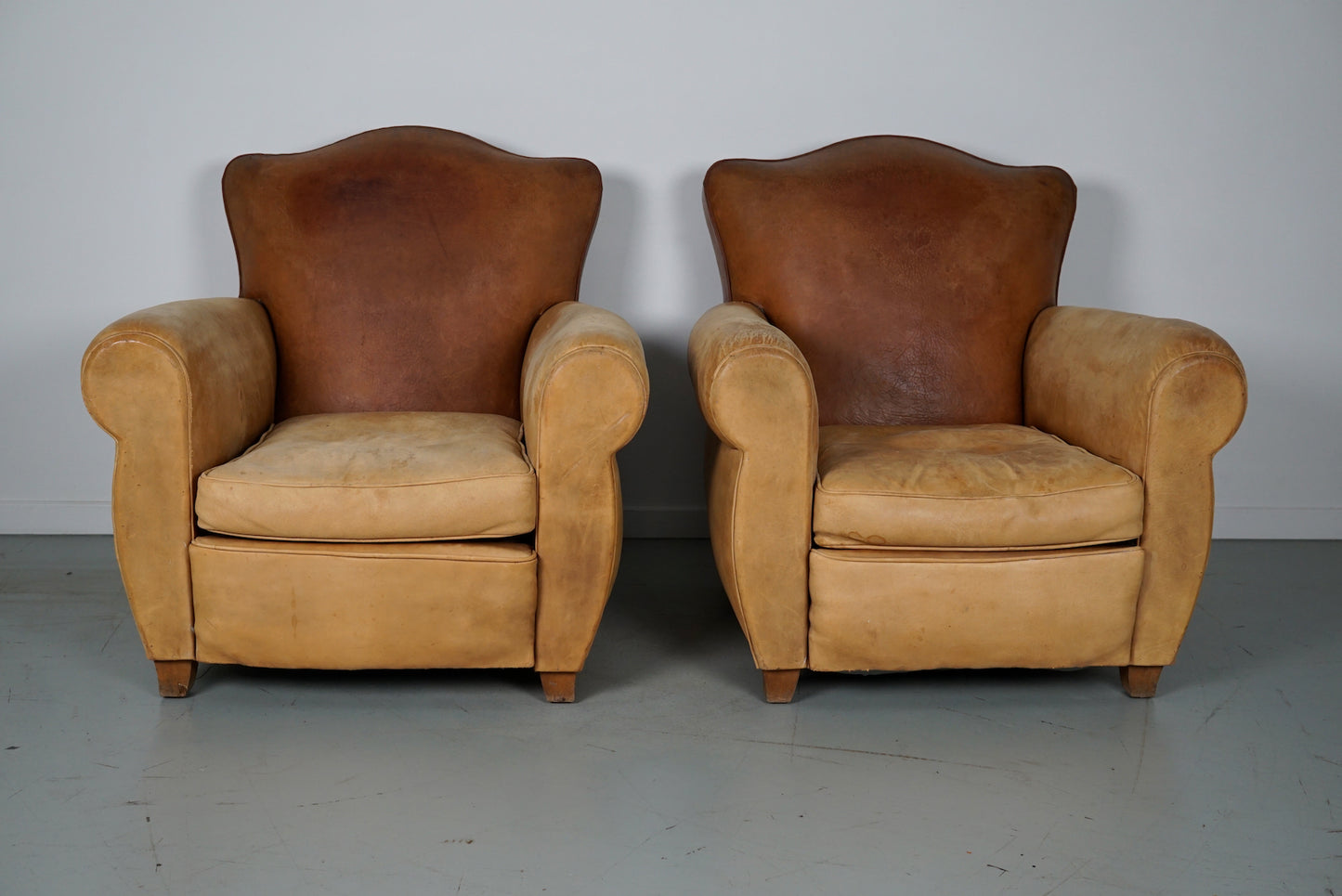 Pair of French Cognac Moustache Back Leather Club Chairs, 1940s
