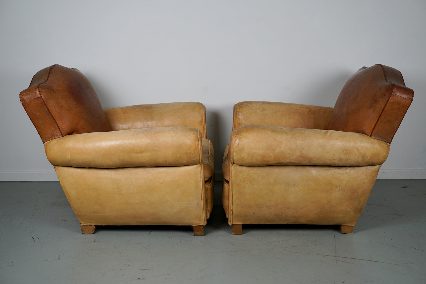 Pair of French Cognac Moustache Back Leather Club Chairs, 1940s