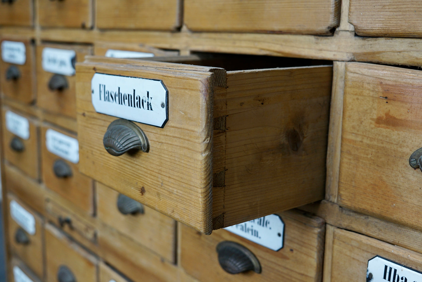 Antique German Pine Apothecary Cabinet with Enamel Shields, 1900s