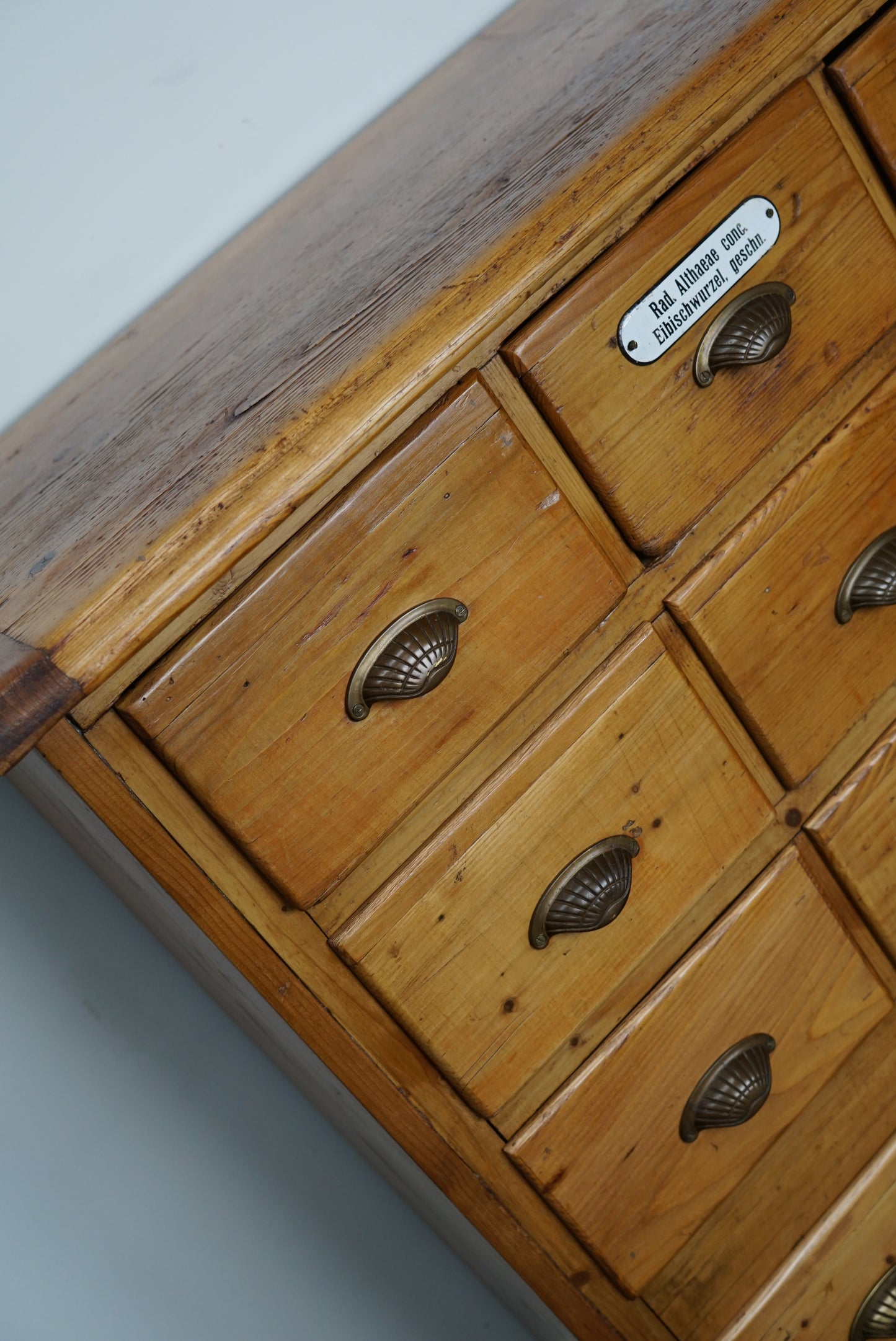 Antique German Pine Apothecary Cabinet with Enamel Shields, 1900s